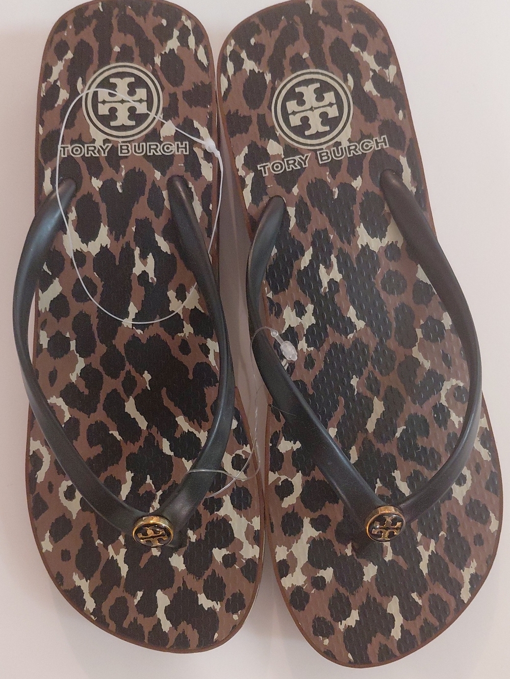 Tory Burch Leopard-Print Flip Flops with Black Straps and Gold Emblems